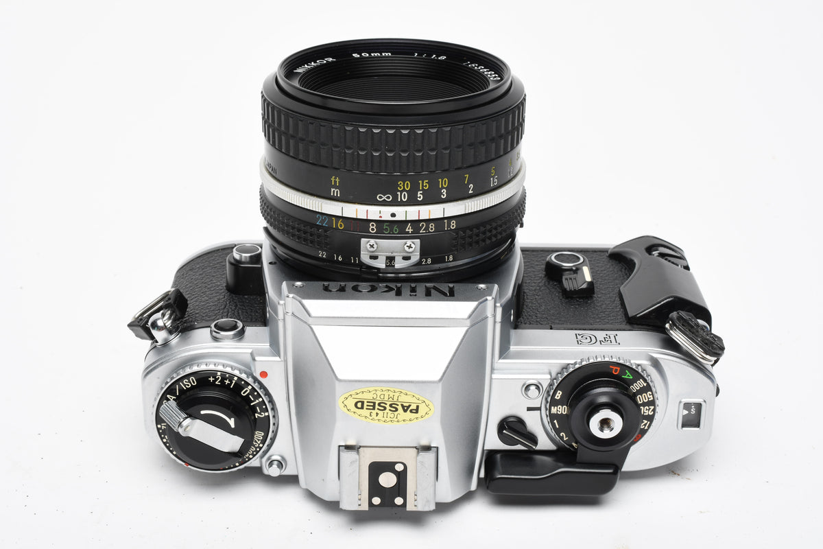 Nikon FG 35mm SLR w/Nikkor 50mm f1.8, New seals, Mint-