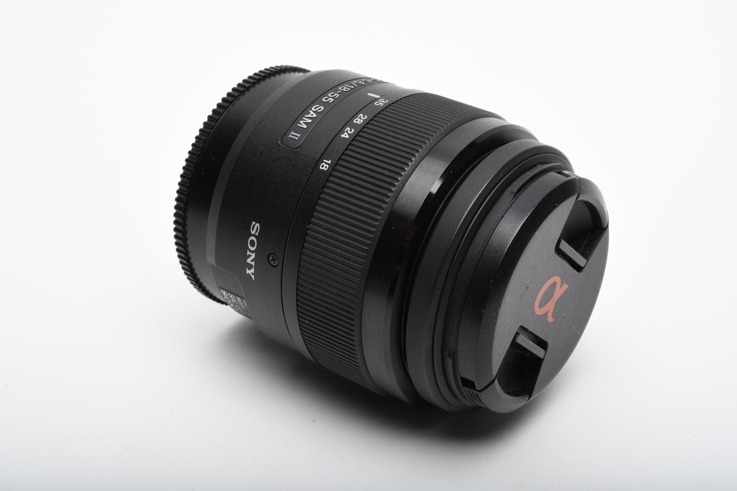 Sony DT 18-55mm f3.5-5.6 II zoom lens, Caps, Stiff zoom, still great