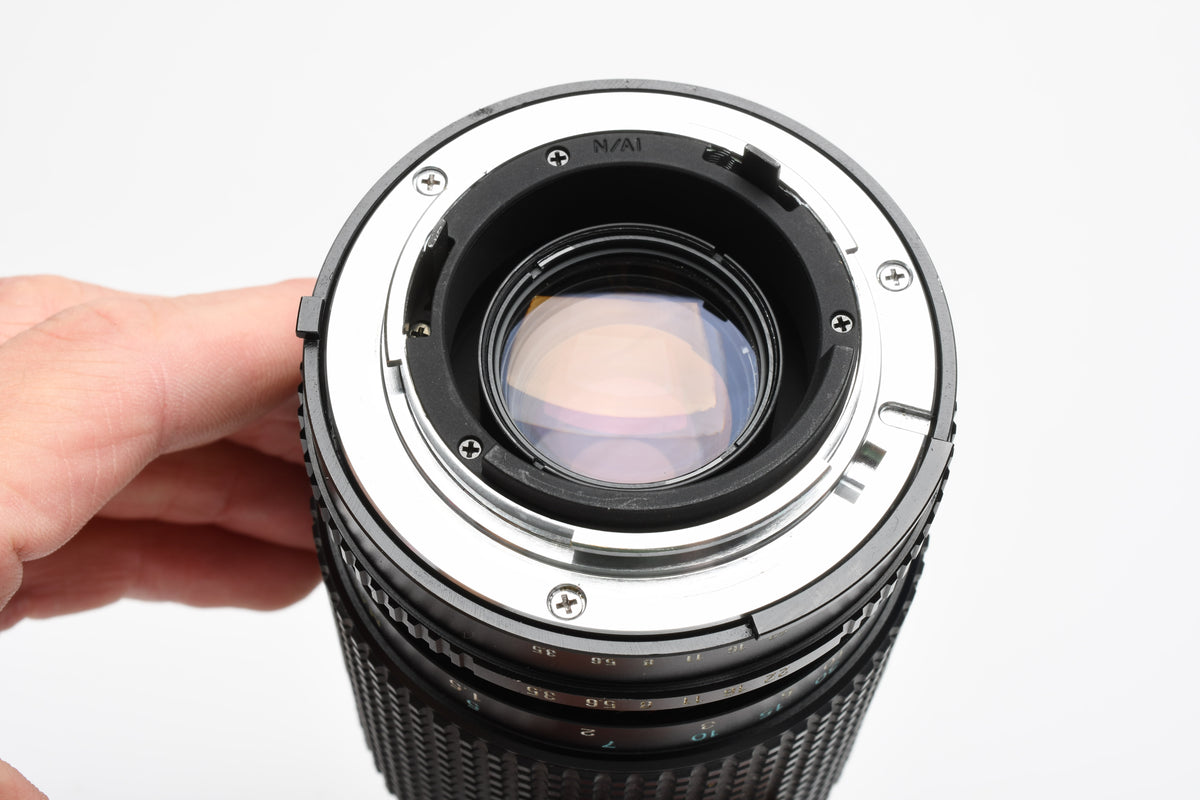 Tokina RMC 35-135mm f3.5-4.5 zoom lens for Nikon Ai-S, Caps, UV, Great