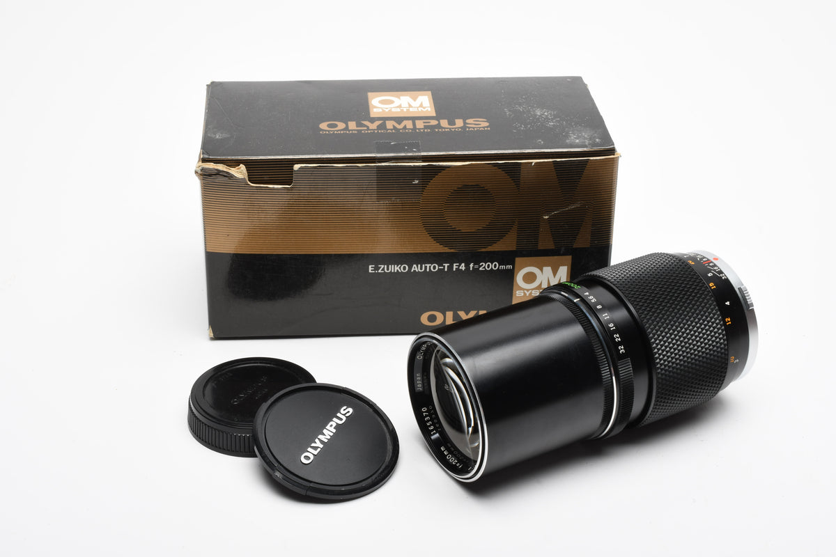 Olympus 200mm f4 E-Zuiko telephoto lens, Caps, Box, Clean