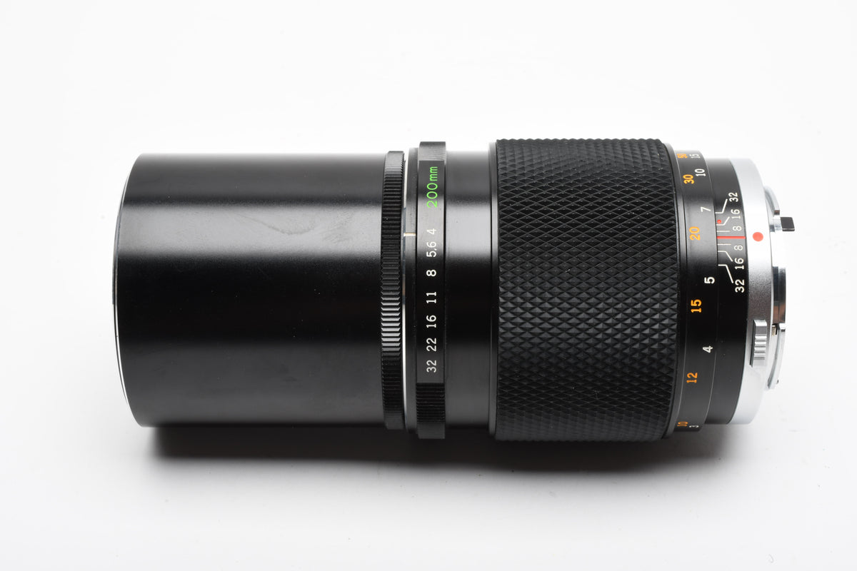 Olympus 200mm f4 E-Zuiko telephoto lens, Caps, Box, Clean