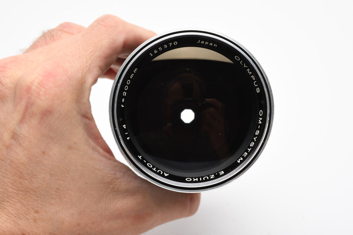 Olympus 200mm f4 E-Zuiko telephoto lens, Caps, Box, Clean