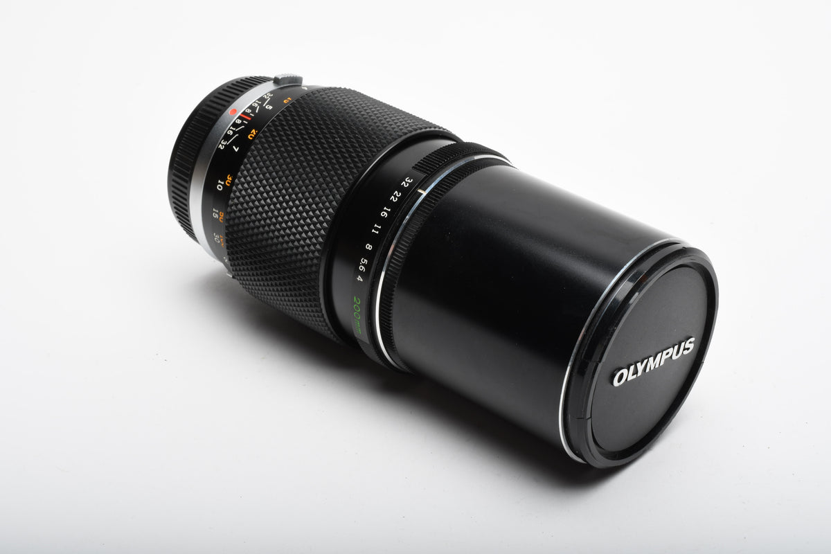 Olympus 200mm f4 E-Zuiko telephoto lens, Caps, Box, Clean