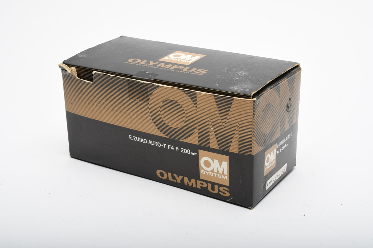 Olympus 200mm f4 E-Zuiko telephoto lens, Caps, Box, Clean