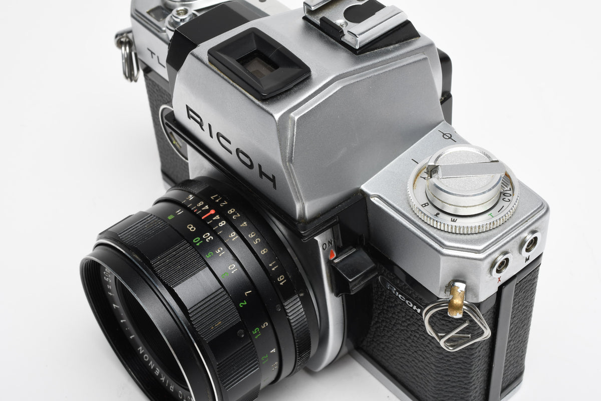 Ricoh TLS 35mm SLR w/Rikenon 50mm f1.7 lens, New seals, Cool!