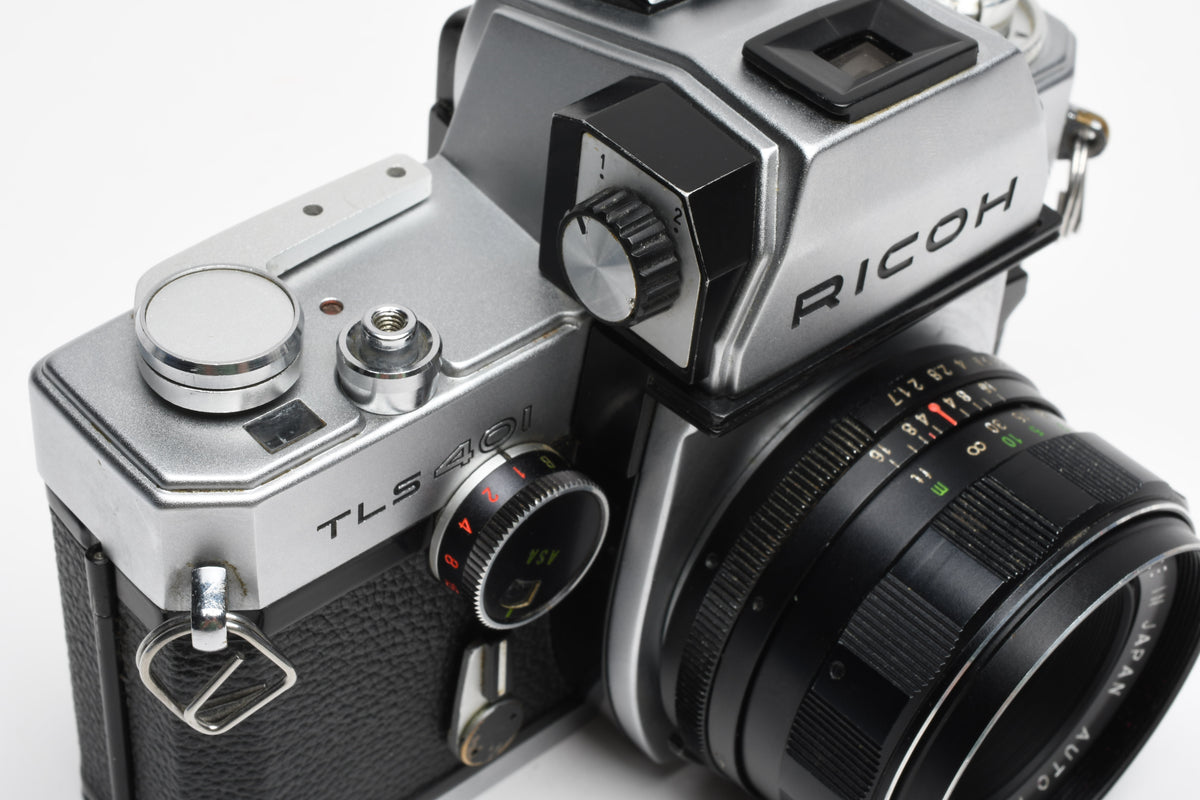 Ricoh TLS 35mm SLR w/Rikenon 50mm f1.7 lens, New seals, Cool!