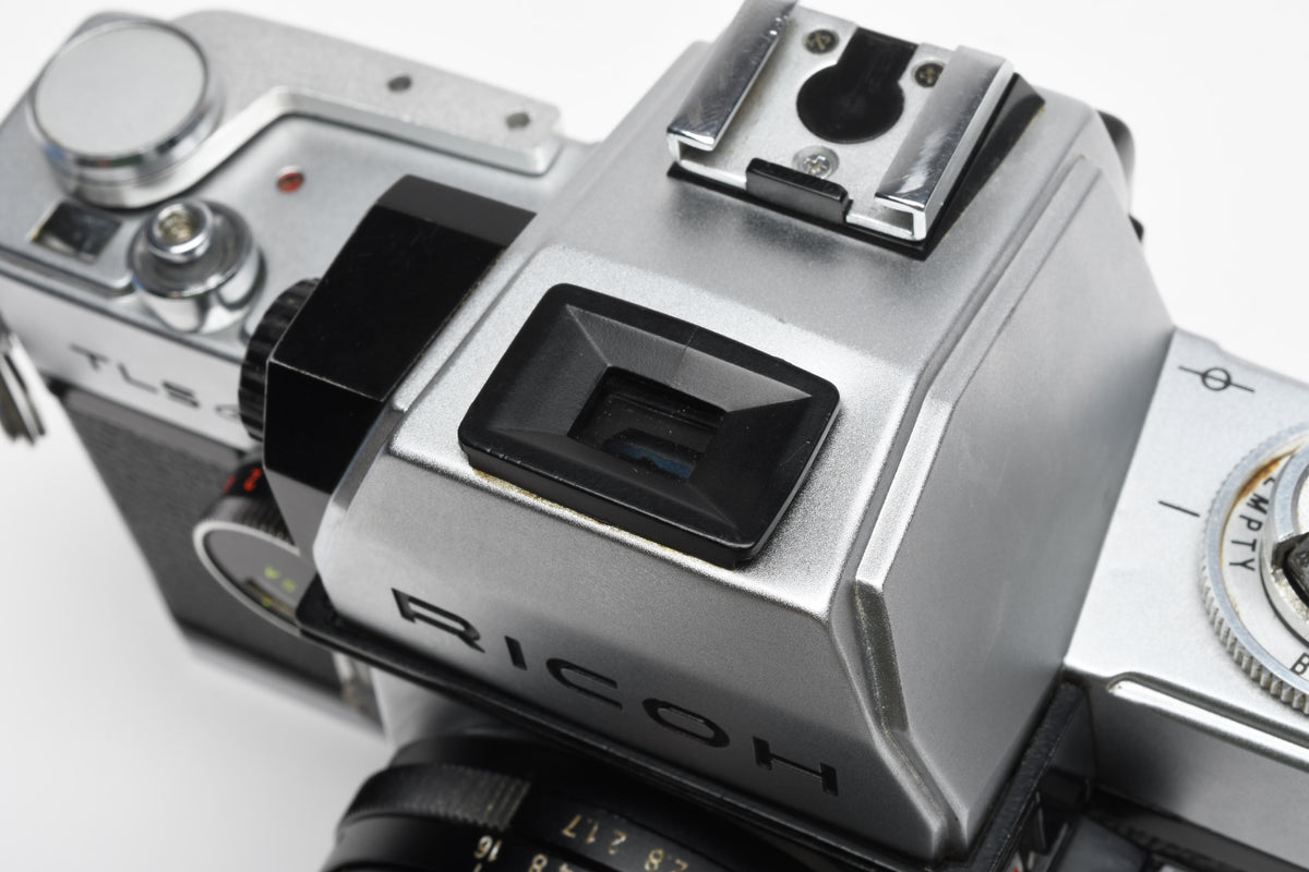 Ricoh TLS 35mm SLR w/Rikenon 50mm f1.7 lens, New seals, Cool!