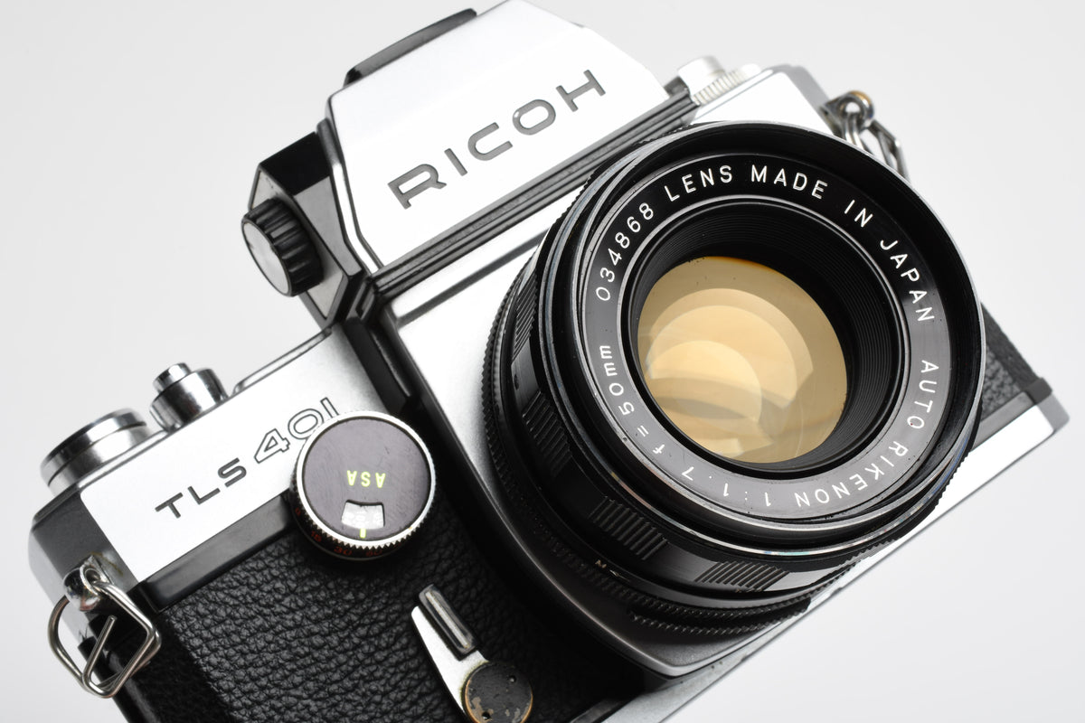 Ricoh TLS 35mm SLR w/Rikenon 50mm f1.7 lens, New seals, Cool!