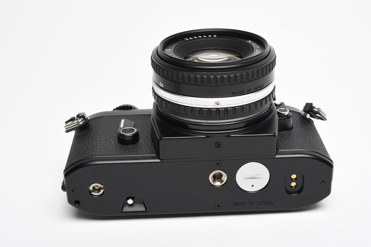Nikon EM 35mm SLR w/Nikon Series E 50mm f1.8 Lens, Strap, New seals, Great!
