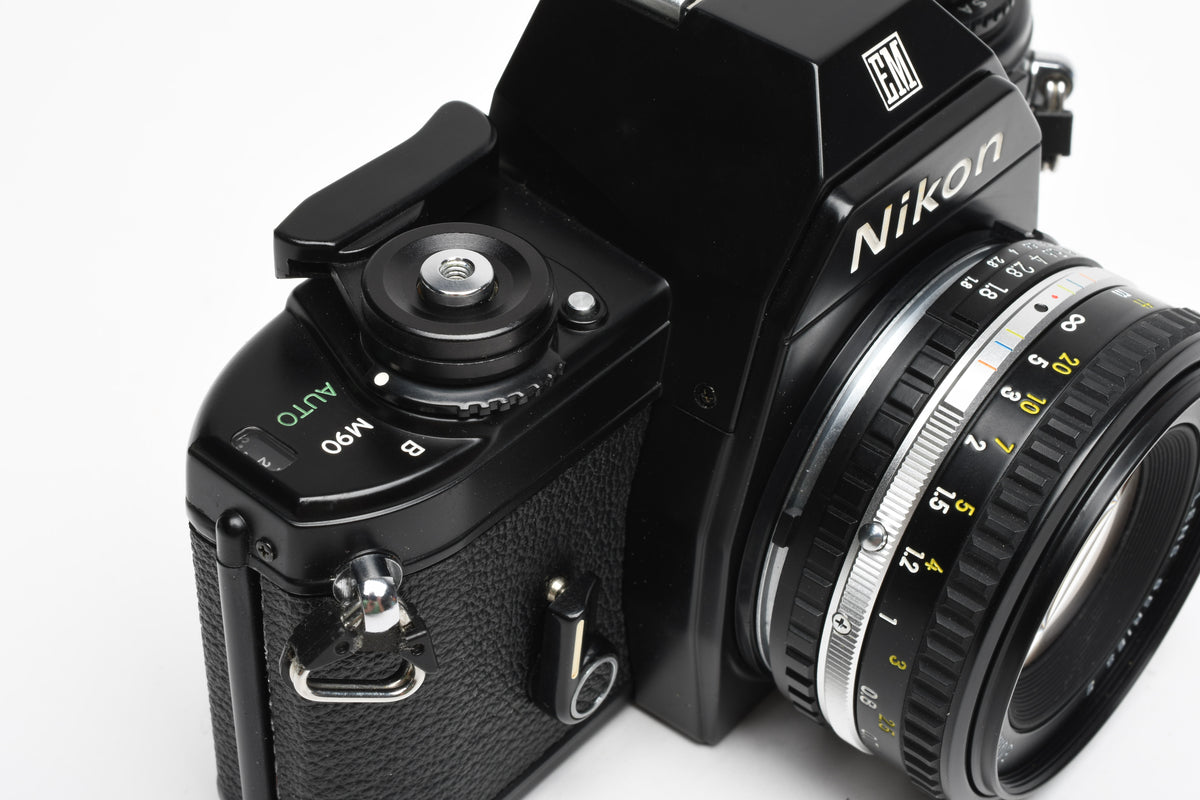 Nikon EM 35mm SLR w/Nikon Series E 50mm f1.8 Lens, Strap, New seals, Great!