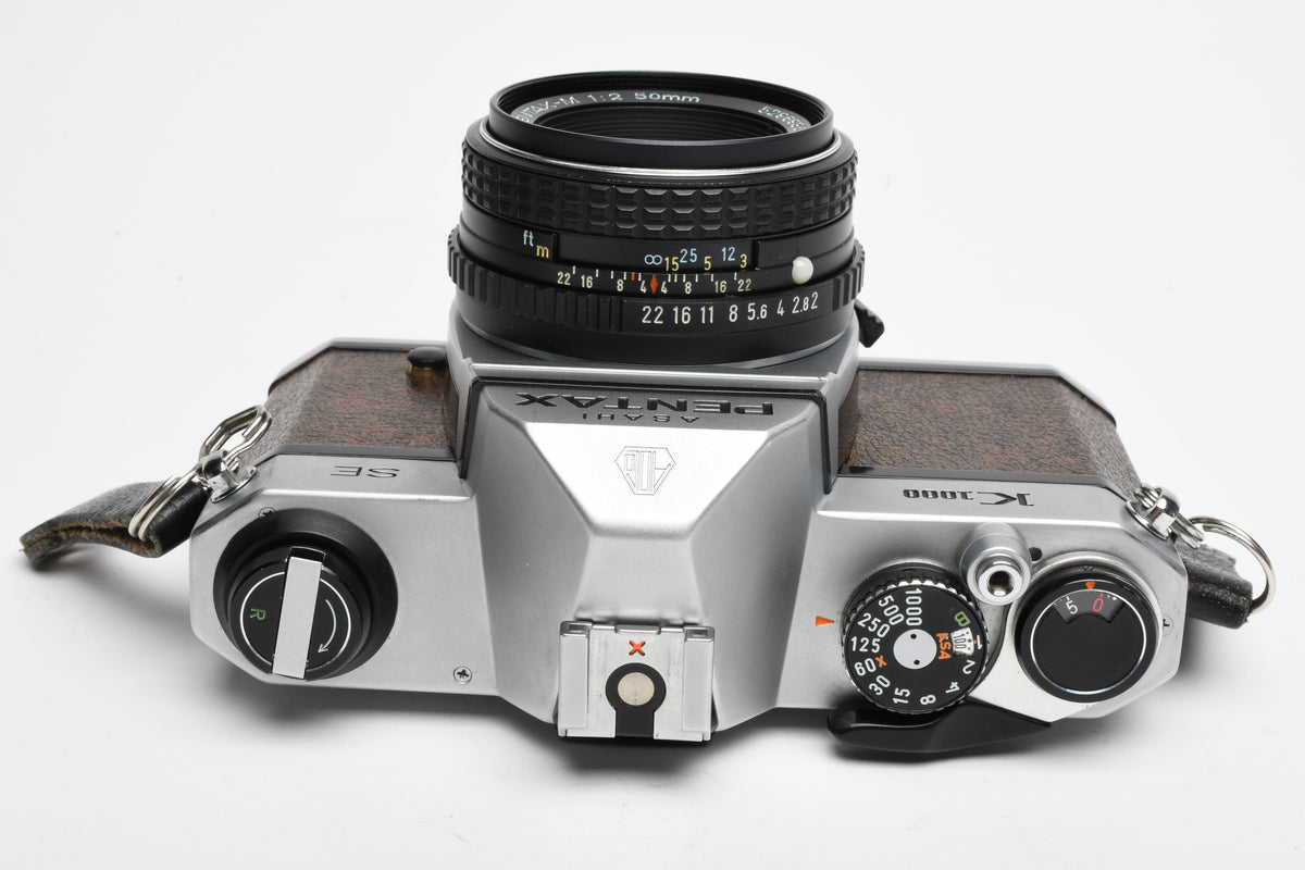 Pentax K1000 SE 35mm SLR w/50mm f2 lens, New seals, strap, Great!