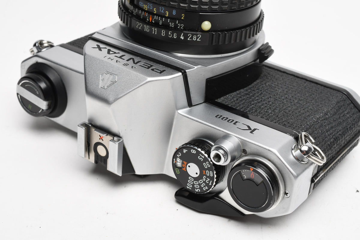 Pentax K1000 35mm SLR w/Pentax-M 50mm f2 lens, New seals