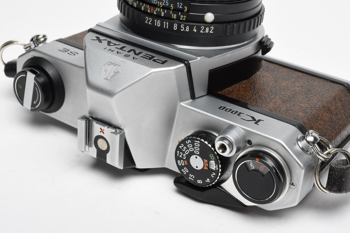 Pentax K1000 SE 35mm SLR w/50mm f2 lens, New seals, strap, Great!