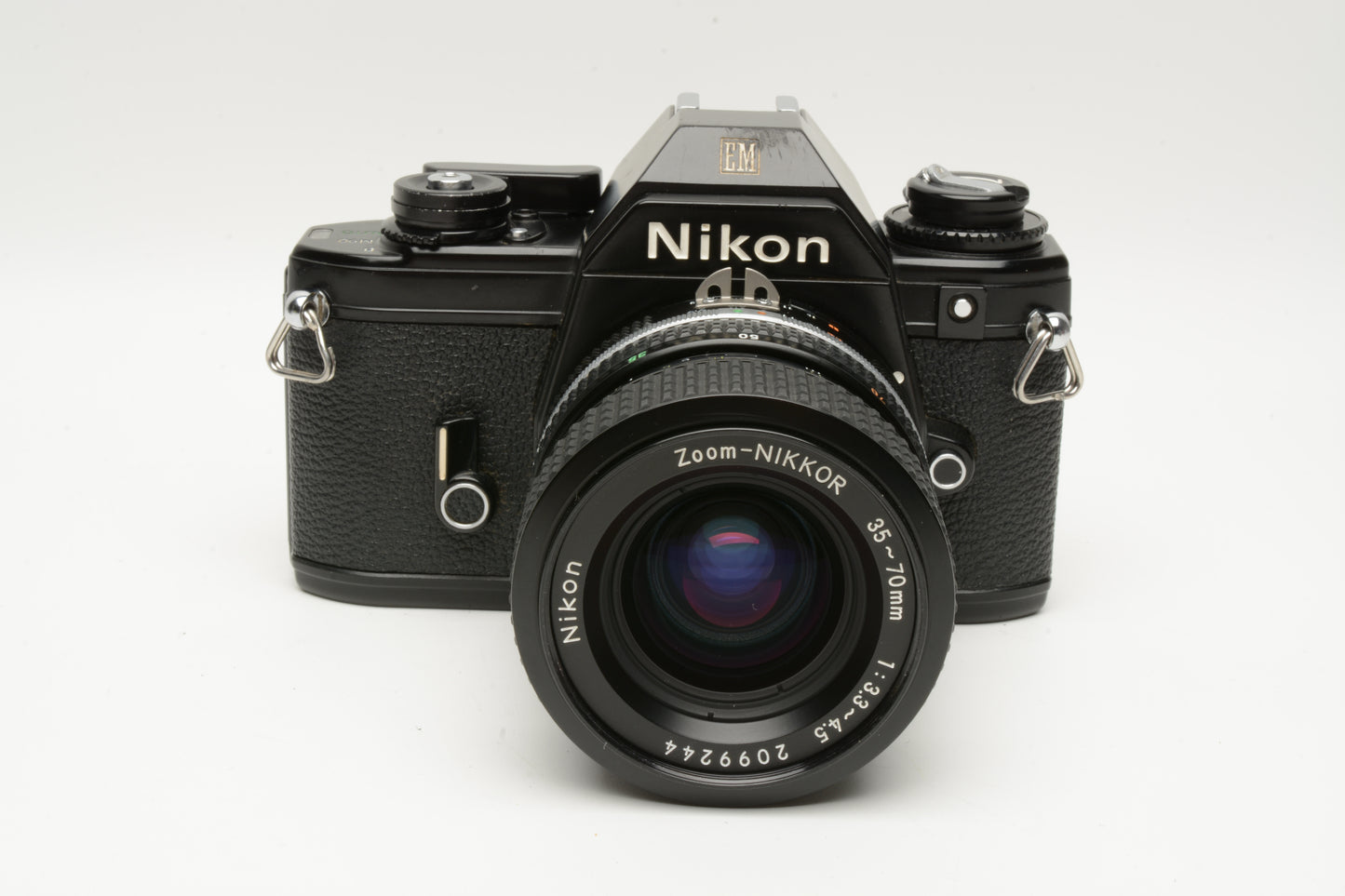 Nikon EM 35mm SLR w/Nikon Nikkor 35-70mm zoom, strap, Tested