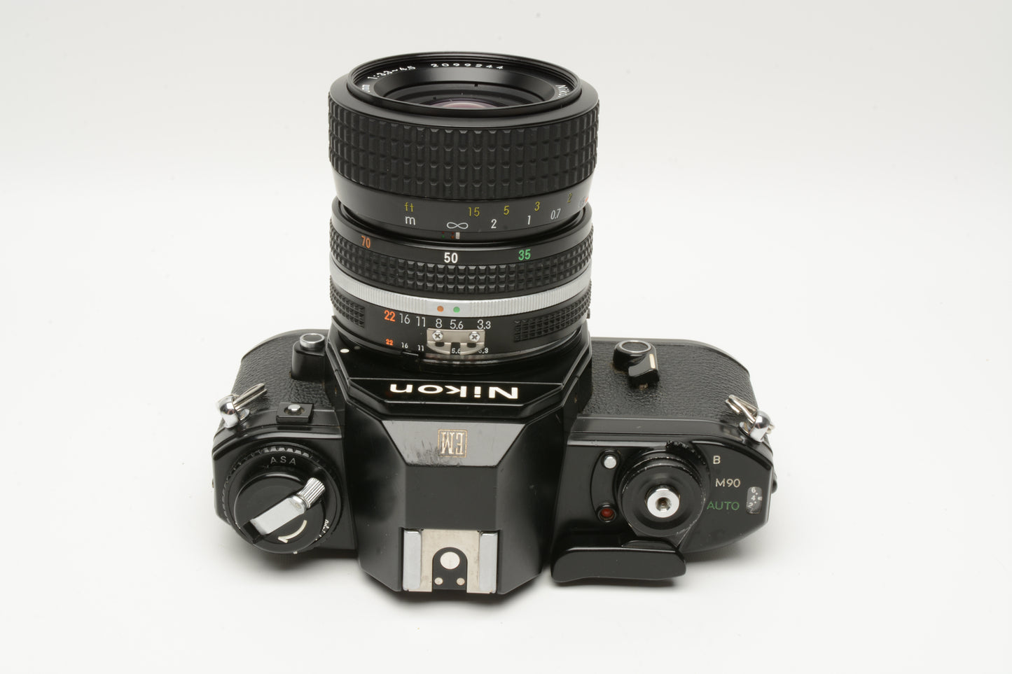 Nikon EM 35mm SLR w/Nikon Nikkor 35-70mm zoom, strap, Tested