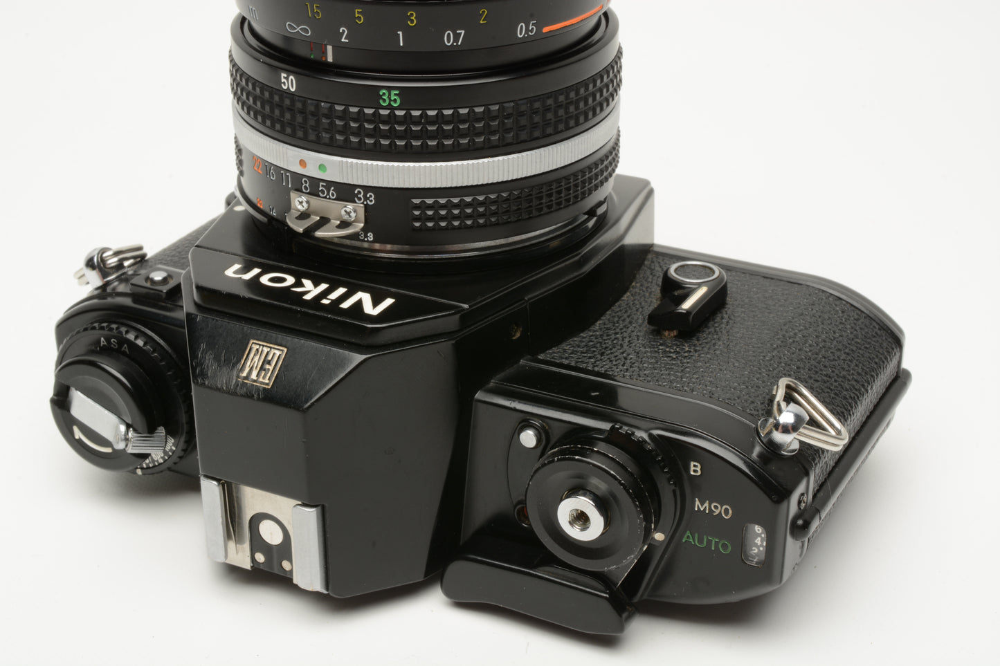 Nikon EM 35mm SLR w/Nikon Nikkor 35-70mm zoom, strap, Tested