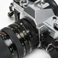 Canon AE-1 35mm SLR Camera w/35-70mm Zoom, New Seals, Case, Great