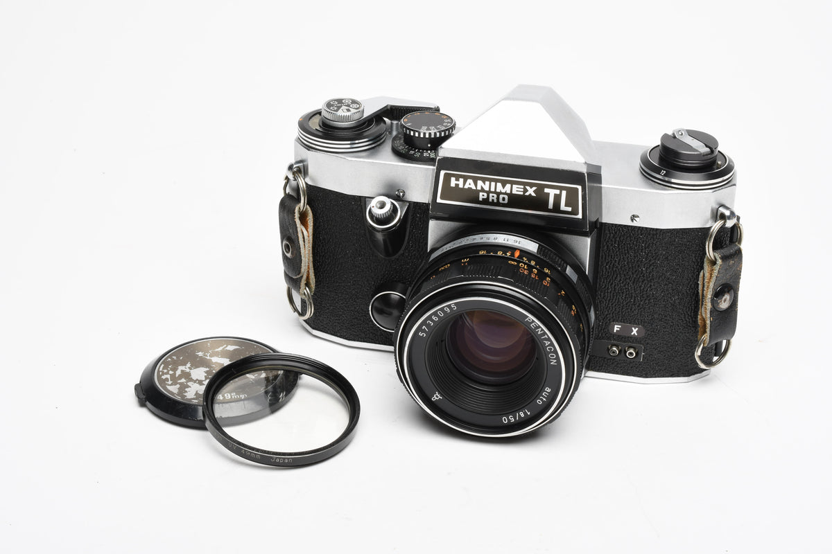 Hanimex Pro TL 35mm SLR w/Pentacon 50mm f1.8 lens, New seals, strap, Great!