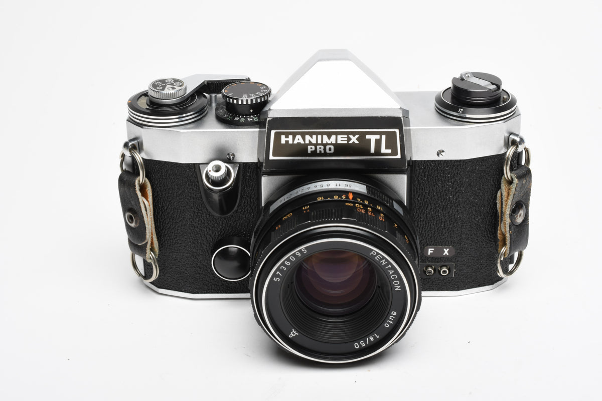 Hanimex Pro TL 35mm SLR w/Pentacon 50mm f1.8 lens, New seals, strap, Great!