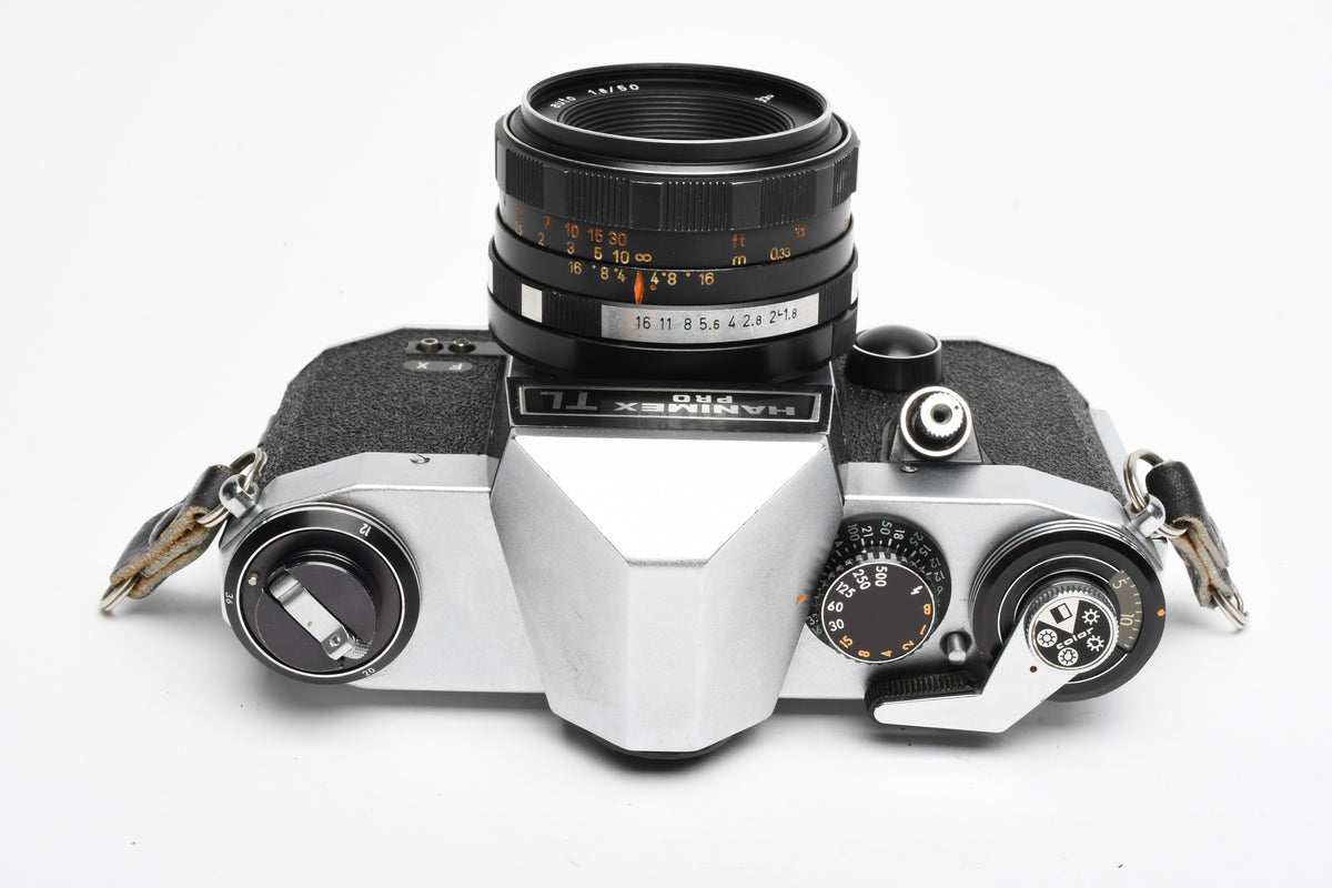 Hanimex Pro TL 35mm SLR w/Pentacon 50mm f1.8 lens, New seals, strap, Great!