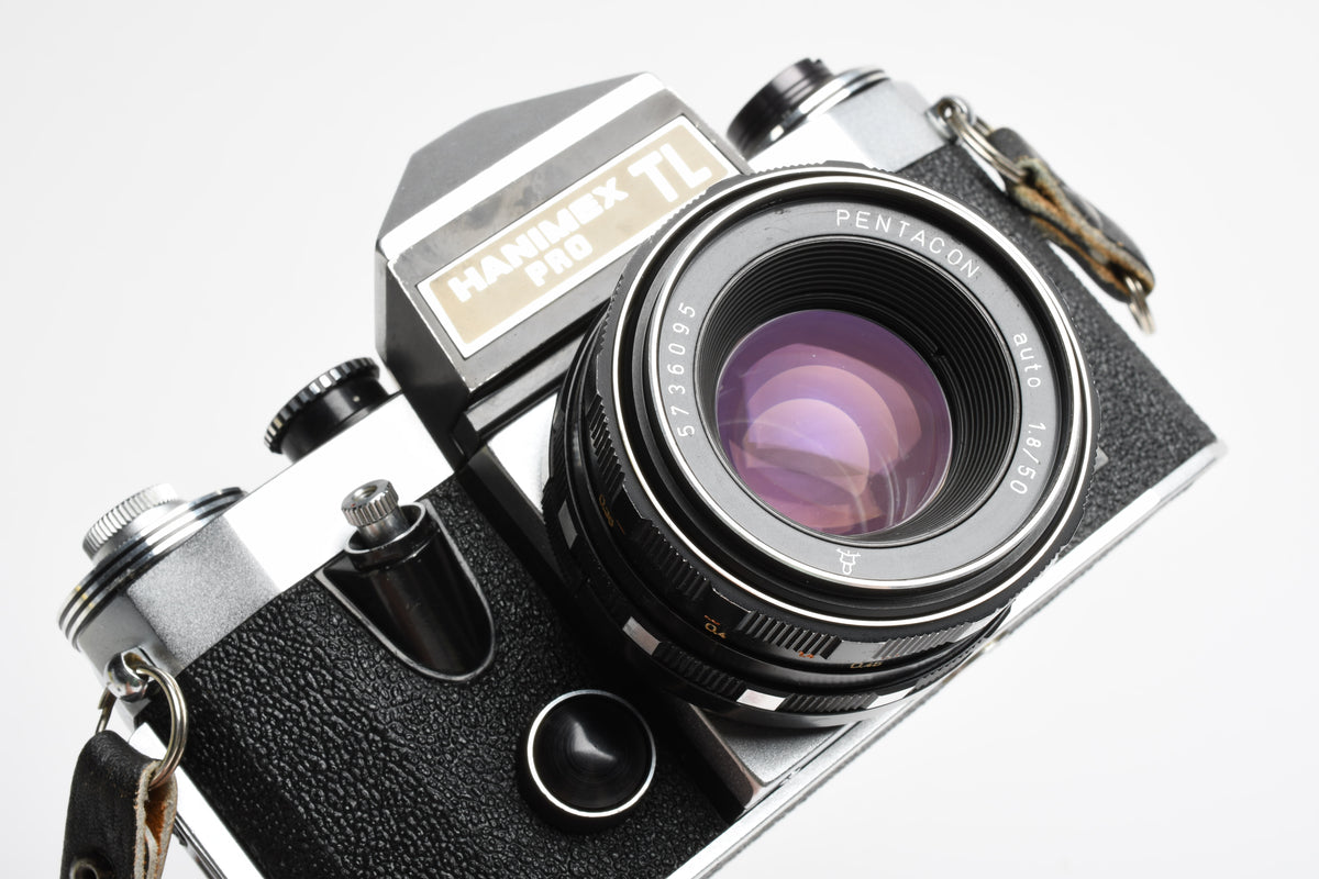 Hanimex Pro TL 35mm SLR w/Pentacon 50mm f1.8 lens, New seals, strap, Great!