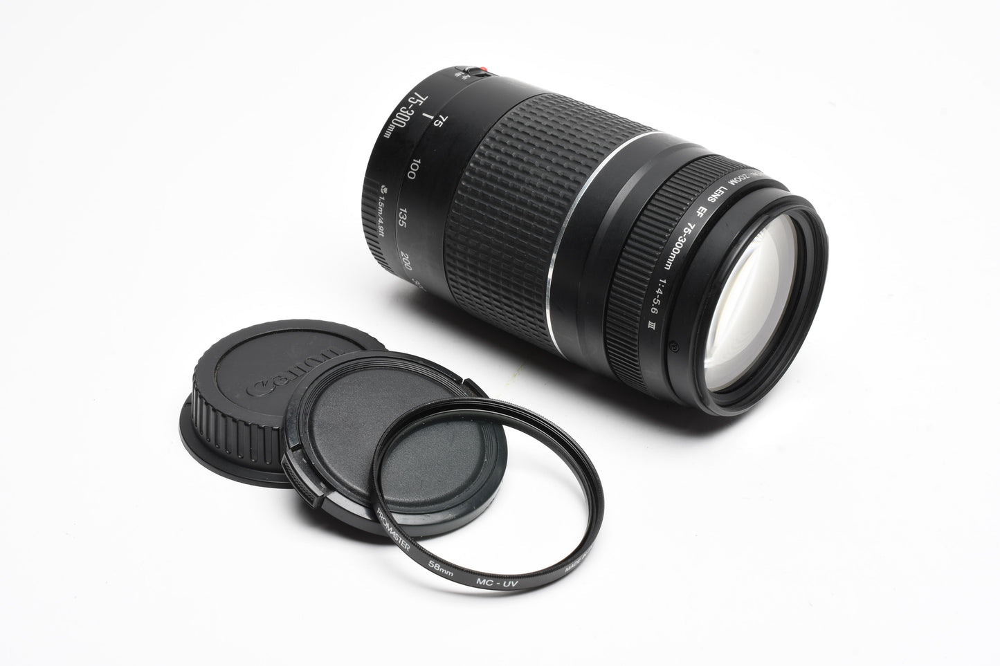 Canon EF 75-300mm f4-5.6 III Telephoto zoom, caps + UV filter