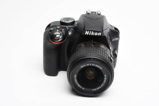 Nikon D3300 DSLR w/18-55mm zoom Batt, charger, strap, Only 15,380 Acts