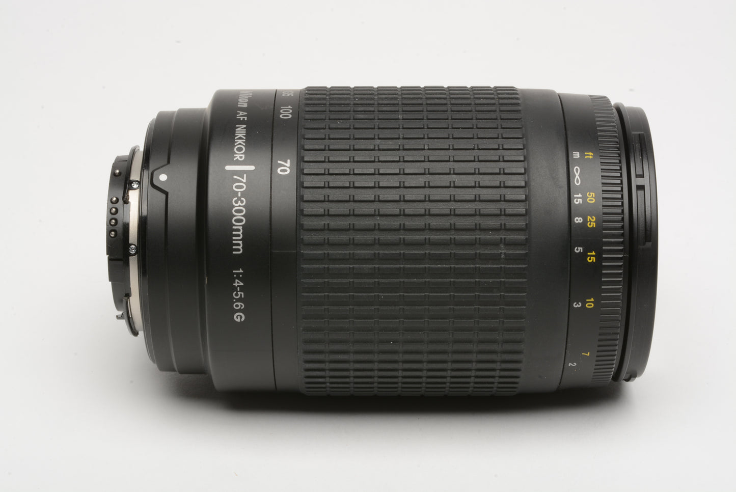 Nikon AF 75-300mm f4-5.6G Telephoto zoom lens w/caps, UV filter, nice