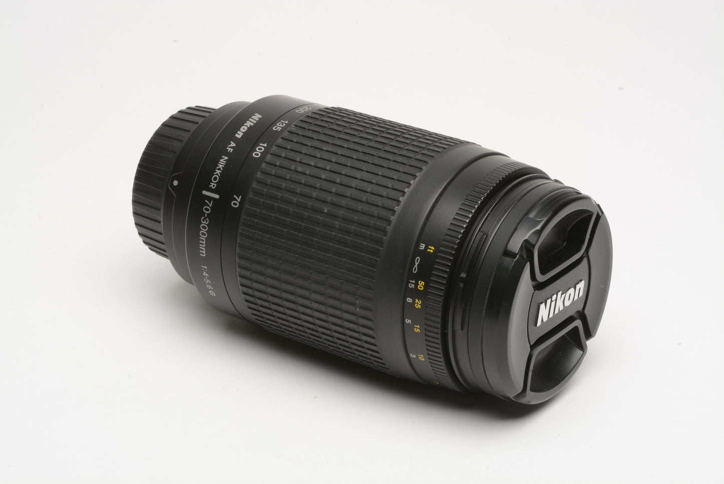 Nikon AF 75-300mm f4-5.6G Telephoto zoom lens w/caps, UV filter, nice