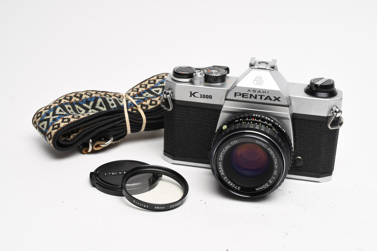 Pentax K1000 35mm SLR w/50mm f2 lens, New seals, strap