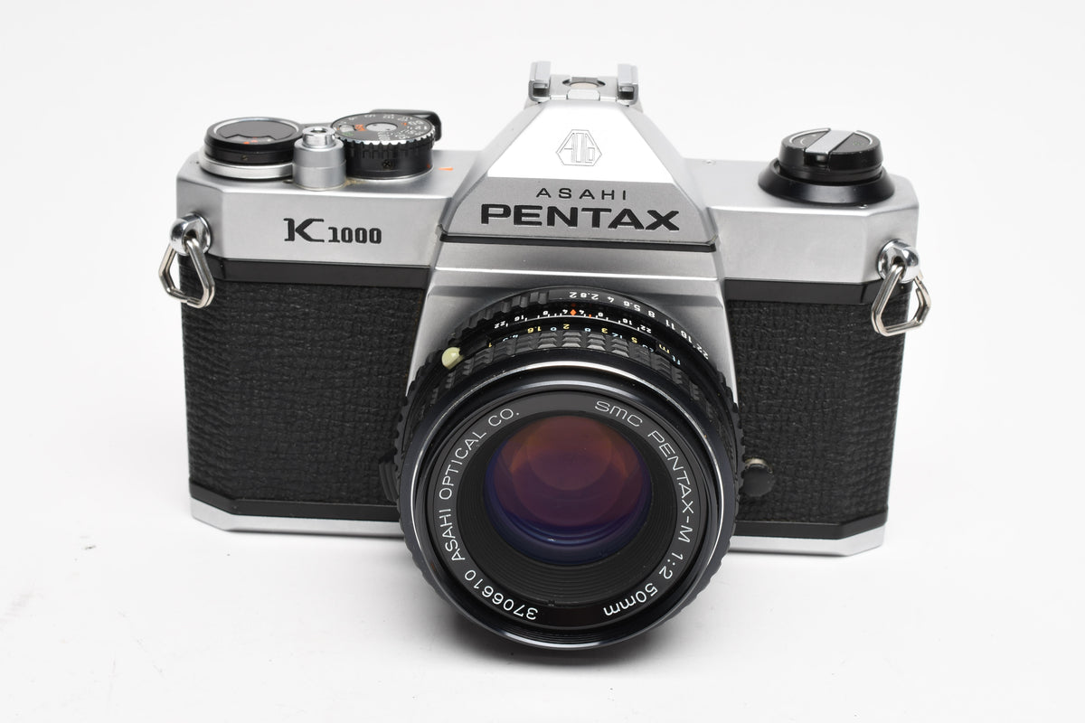 Pentax K1000 35mm SLR w/50mm f2 lens, New seals, strap