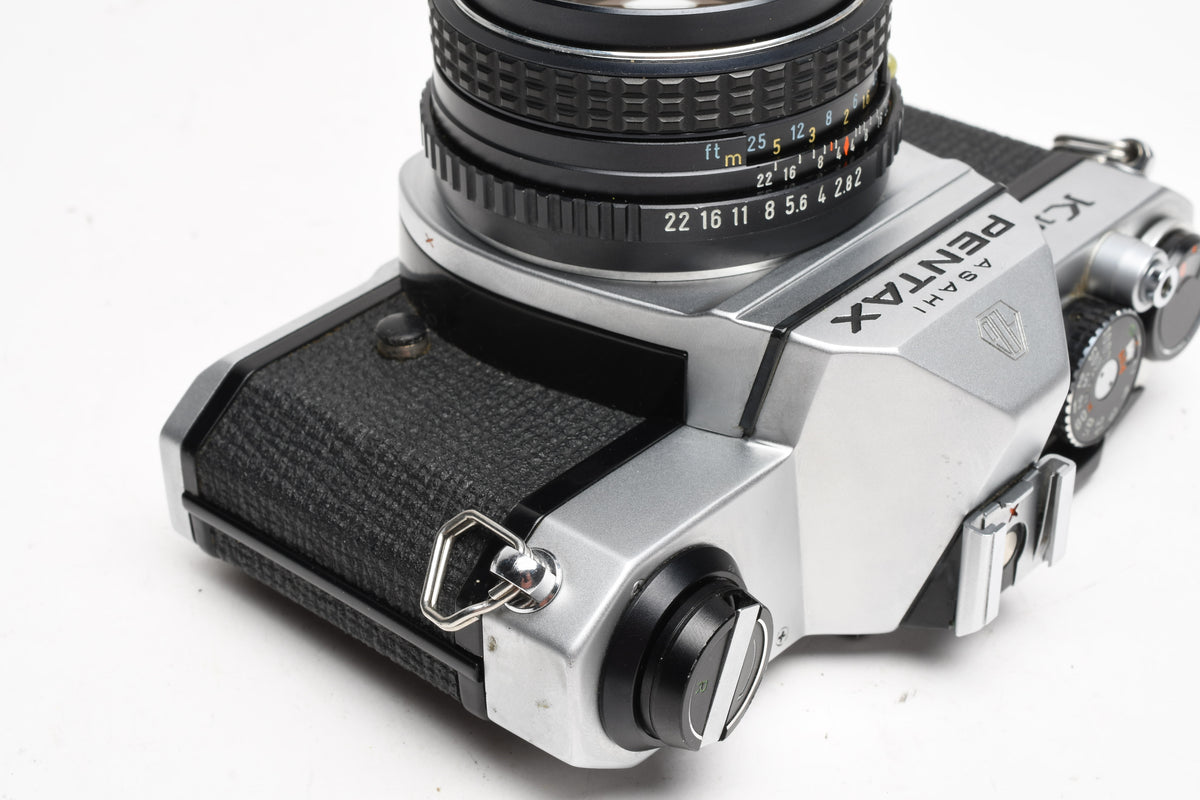 Pentax K1000 35mm SLR w/50mm f2 lens, New seals, strap