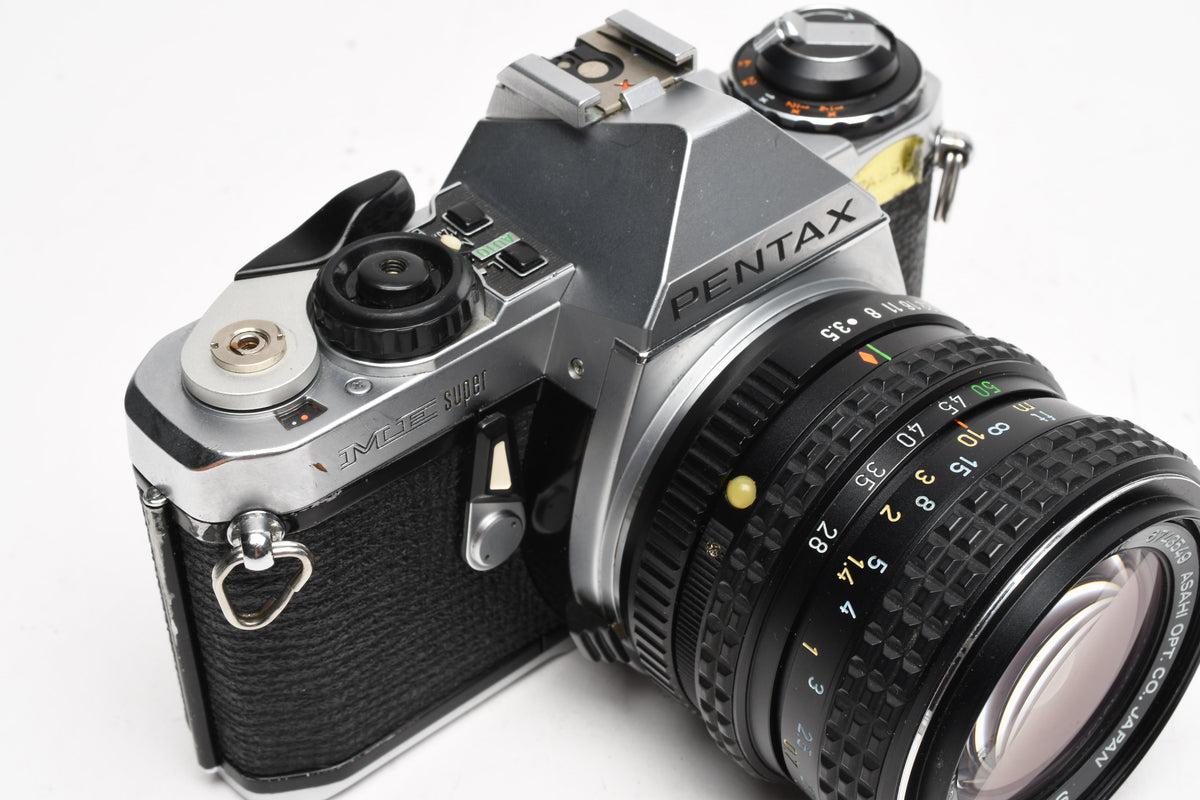 Pentax ME Super 35mm SLR w/28-50mm F3.5-4.5 Lens, Strap, Manual, New seals, Tested