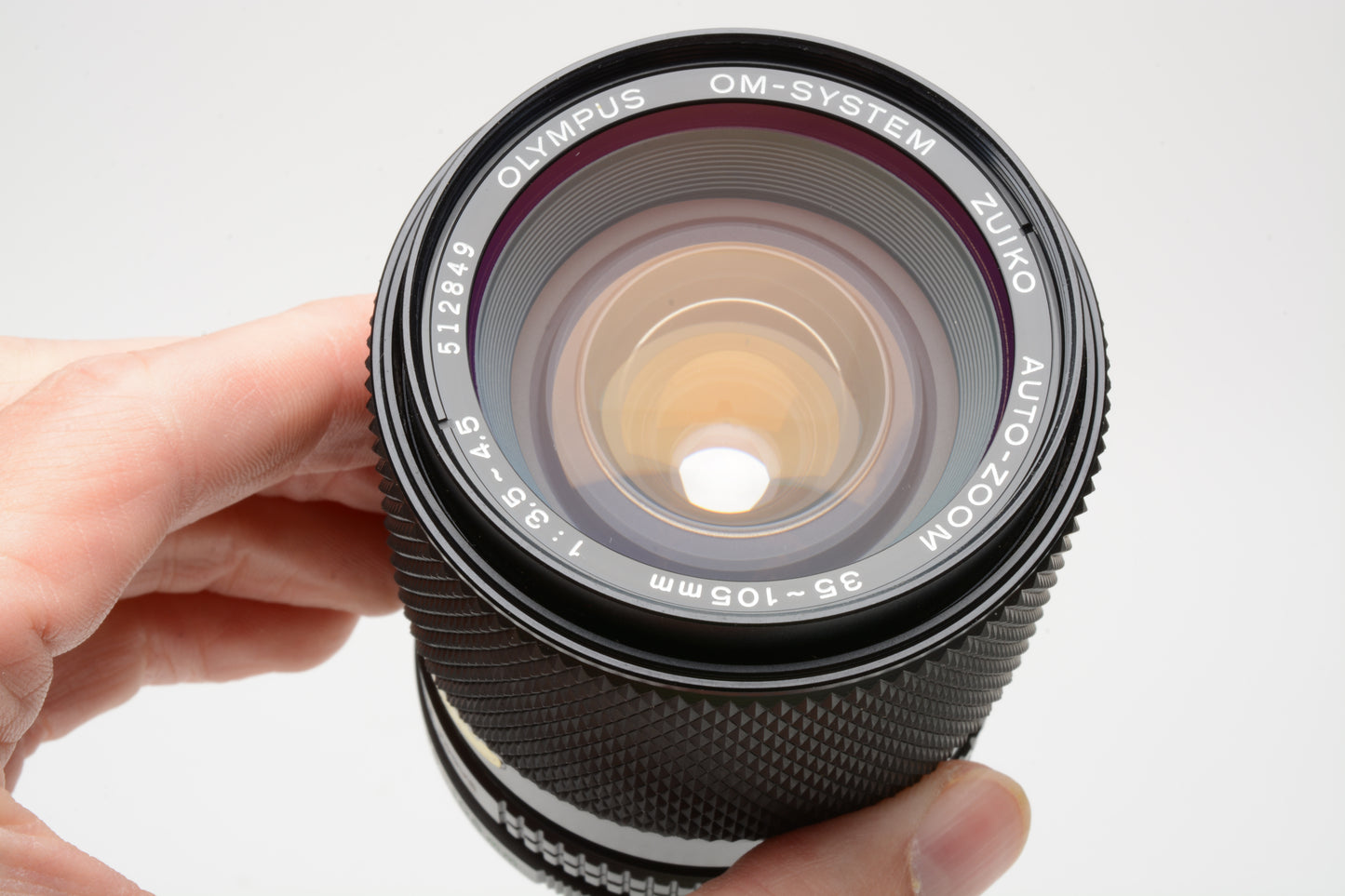 Olympus OM Zuiko 35-105mm f3.5-4.5 zoom lens, Hood, Caps, UV, Mint-