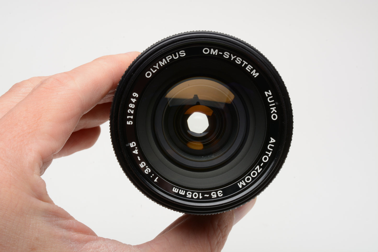 Olympus OM Zuiko 35-105mm f3.5-4.5 zoom lens, Hood, Caps, UV, Mint-