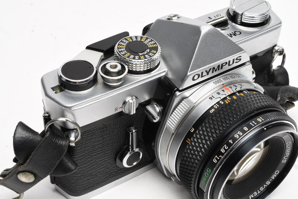 Olympus OM-1 chrome 35mm SLR w/Olympus Zuiko 50mm f/1.8 Lens