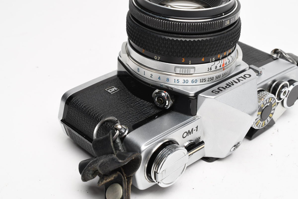 Olympus OM-1 chrome 35mm SLR w/Olympus Zuiko 50mm f/1.8 Lens