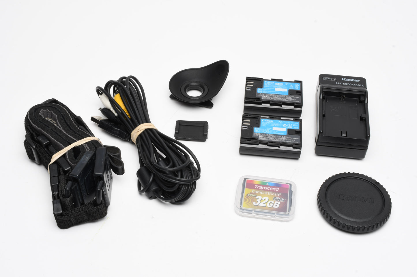 Canon EOS 7D 18MP DSLR body w/ 2 batts, charger, eyecup, 32GB CF, 14K acts!