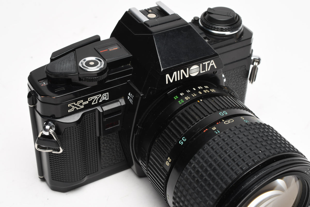 Minolta X-7A 35mm SLR w/28-70mm F3.5-4.5 Zoom lens, New Seals, Strap
