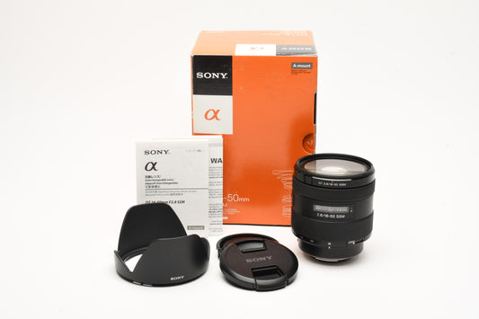Sony DT 16-50mm f2.8 SSM lens, Boxed, Hood+caps+papers, Mint-