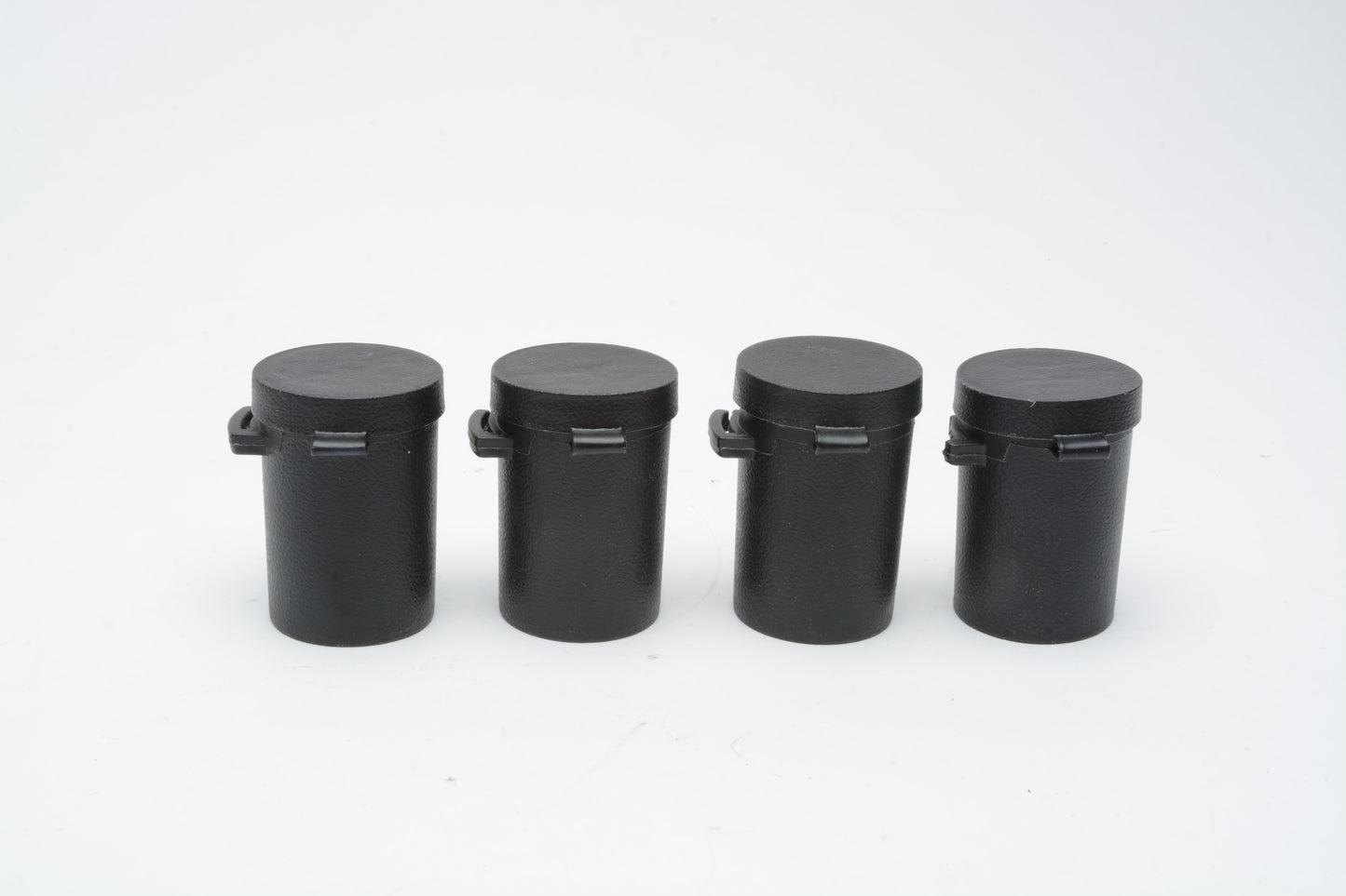 4x Star-D black plastic film canisters for 35mm film, clean