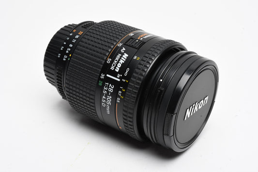 Nikon AF Nikkor 28-105mm f3.5-4.5D macro zoom lens, Caps + UV