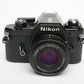 Nikon EM 35mm SLR w/Nikon Series E 50mm f1.8 lens, strap, cap, new seals + case