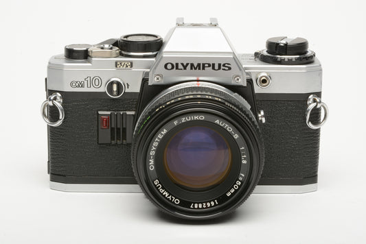 Olympus OM-10 35mm SLR w/50mm f1.8 Zuiko lens, manual, strap, cap, tested, new seals
