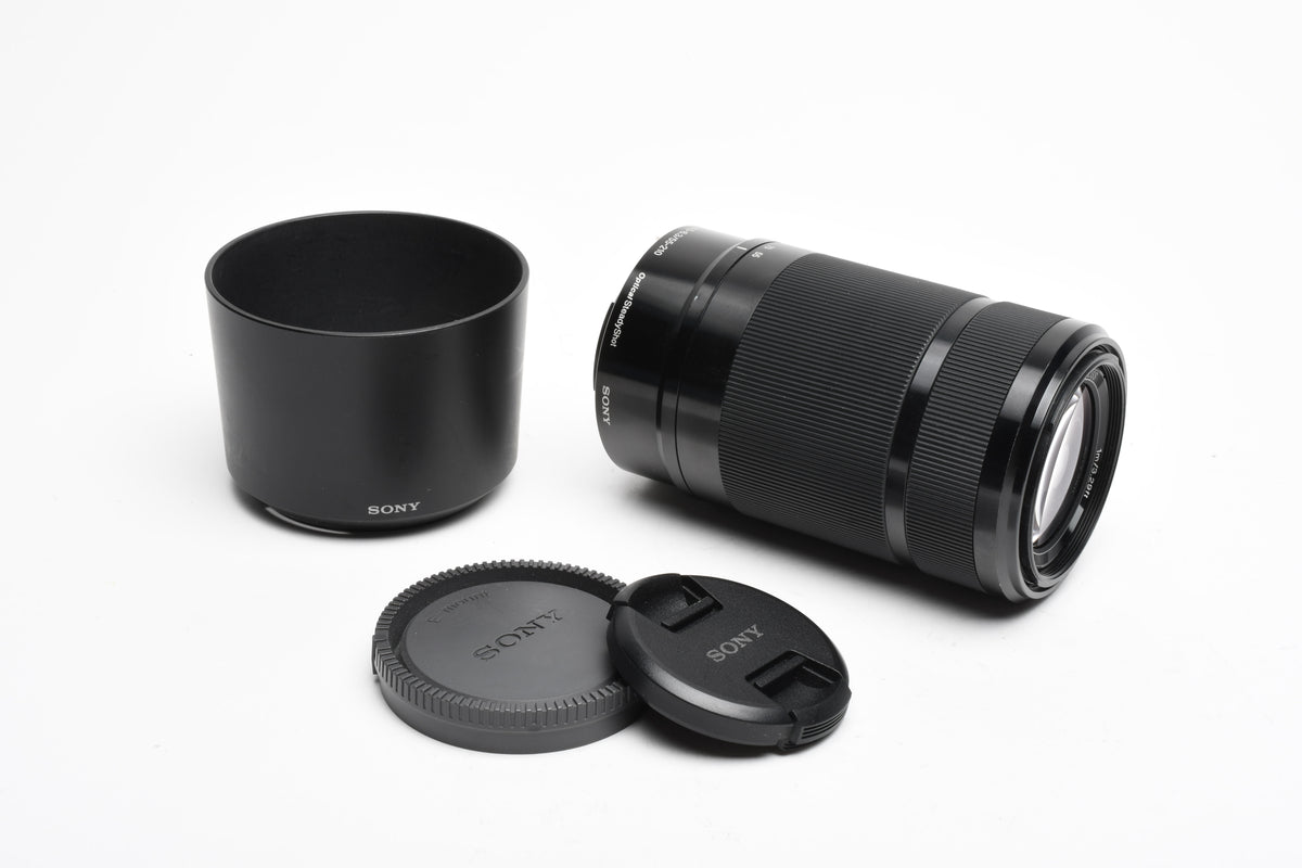 Sony 55-210mm f4.5-6.3 OSS zoom lens (Black) w/Lens caps, Lens hood