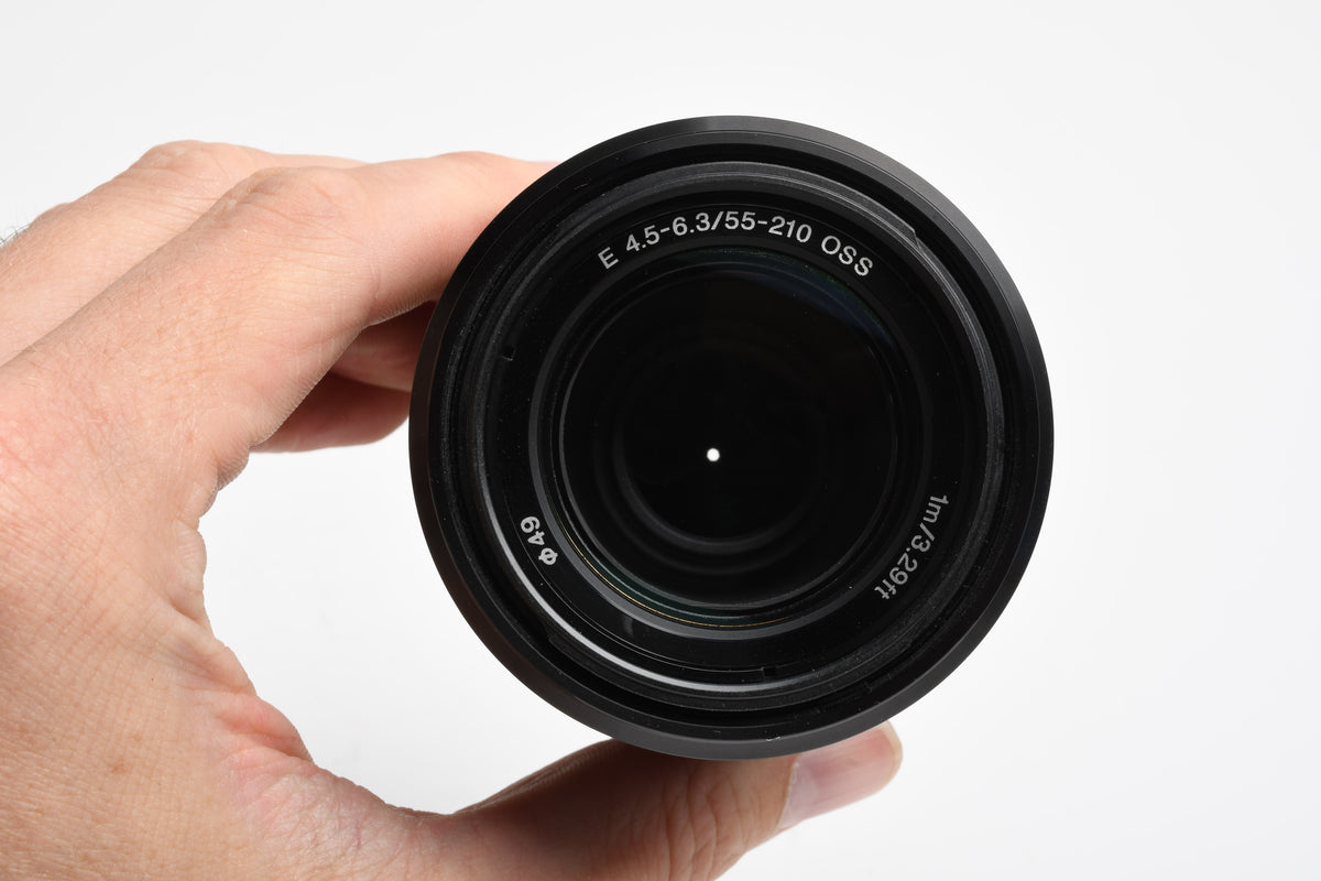 Sony 55-210mm f4.5-6.3 OSS zoom lens (Black) w/Lens caps, Lens hood
