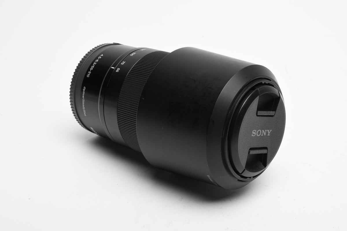 Sony 55-210mm f4.5-6.3 OSS zoom lens (Black) w/Lens caps, Lens hood