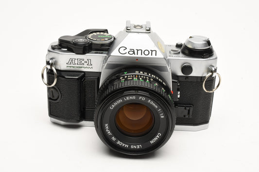 Canon AE-1 Program 35mm SLR Camera w/50mm f1.8, New Seals, Manual, Tested
