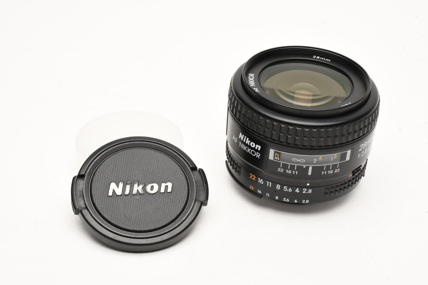 Nikon AF 28mm f2.8D wide lens, caps nice & clean! Sharp