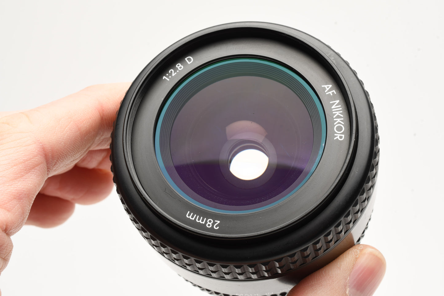 Nikon AF 28mm f2.8D wide lens, caps nice & clean! Sharp